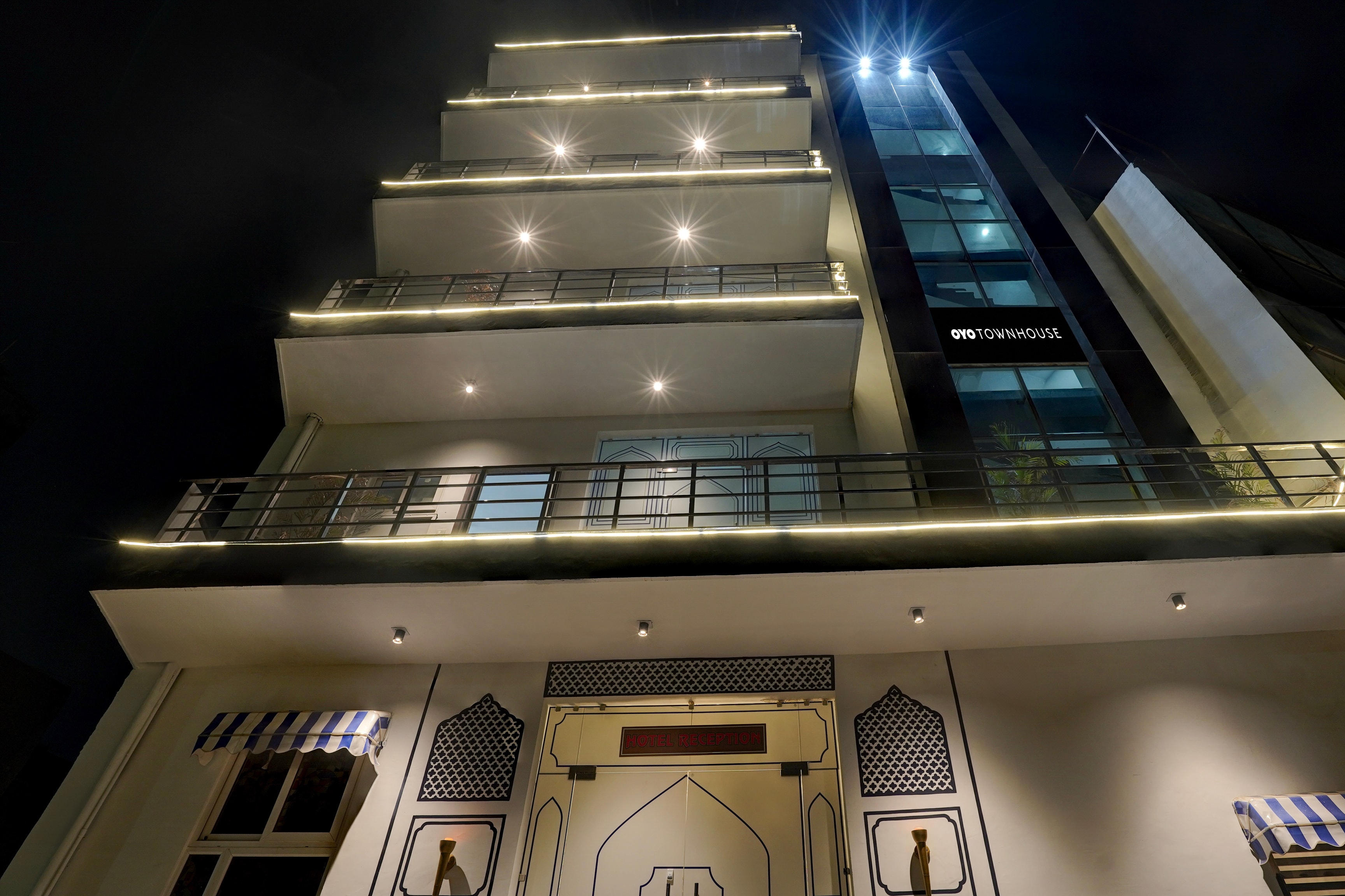 Hotel O Golf Inn Rooms - Tap to explore photos