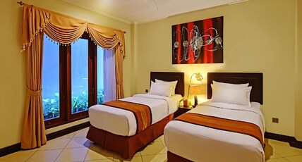 Kuta Town House Room Type - Family 2 Bedroom Pool View Kuta Town House Room Type - Family 2 Bedroom Pool View