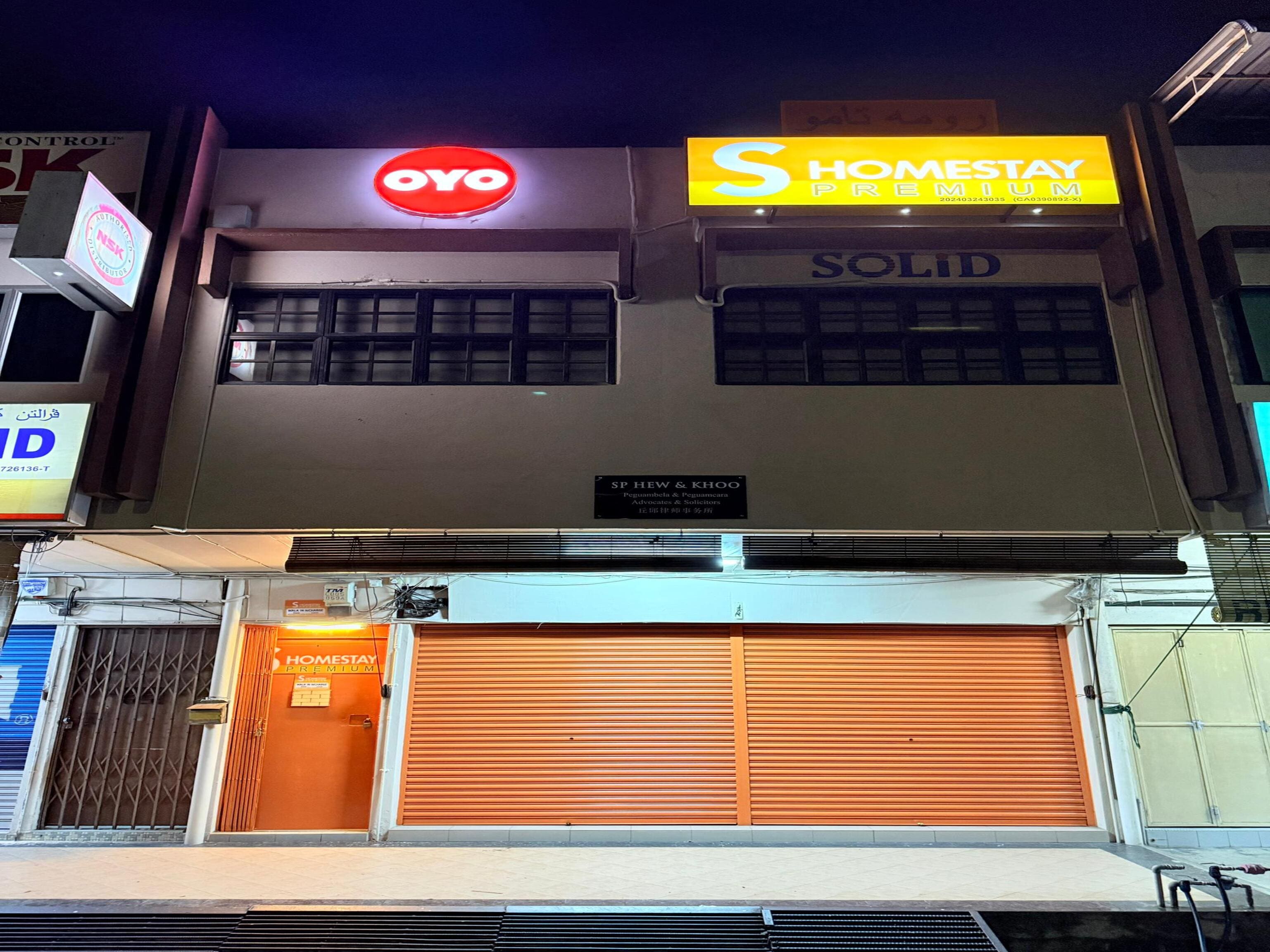 Hotel O S Homestay Premium - Tap to explore photos