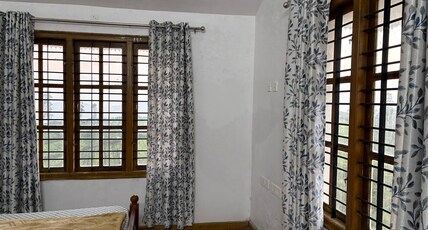 SATHYA HOLIDAYS Room Type - Bedroom 1