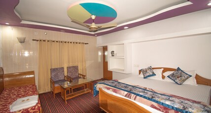 Hotel Devbhoomi (In House Parking) Room Type - Super Deluxe Double Room