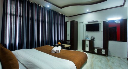 Hotel Naddi Mount View Room Type - Premium Room (With balcony and City View) Hotel Naddi Mount View Room Type - Premium Room (With balcony and City View)