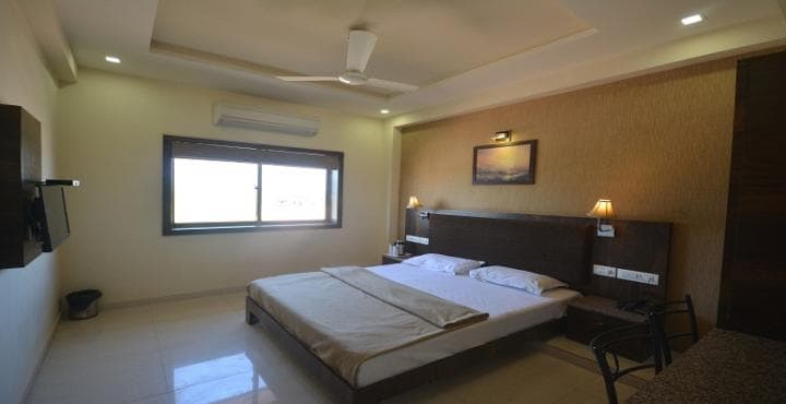 Hotel Radhe - Tap to explore photos