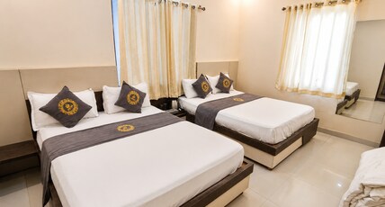 HOTEL PUJARI Room Type - EXECUTIVE FAMILY ROOM
