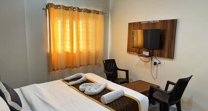 G R S Comforts Room Type - Deluxe Room AC