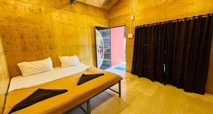 COCONUT COASTAL VILLA & COTTAGE Room Type - Deluxe room