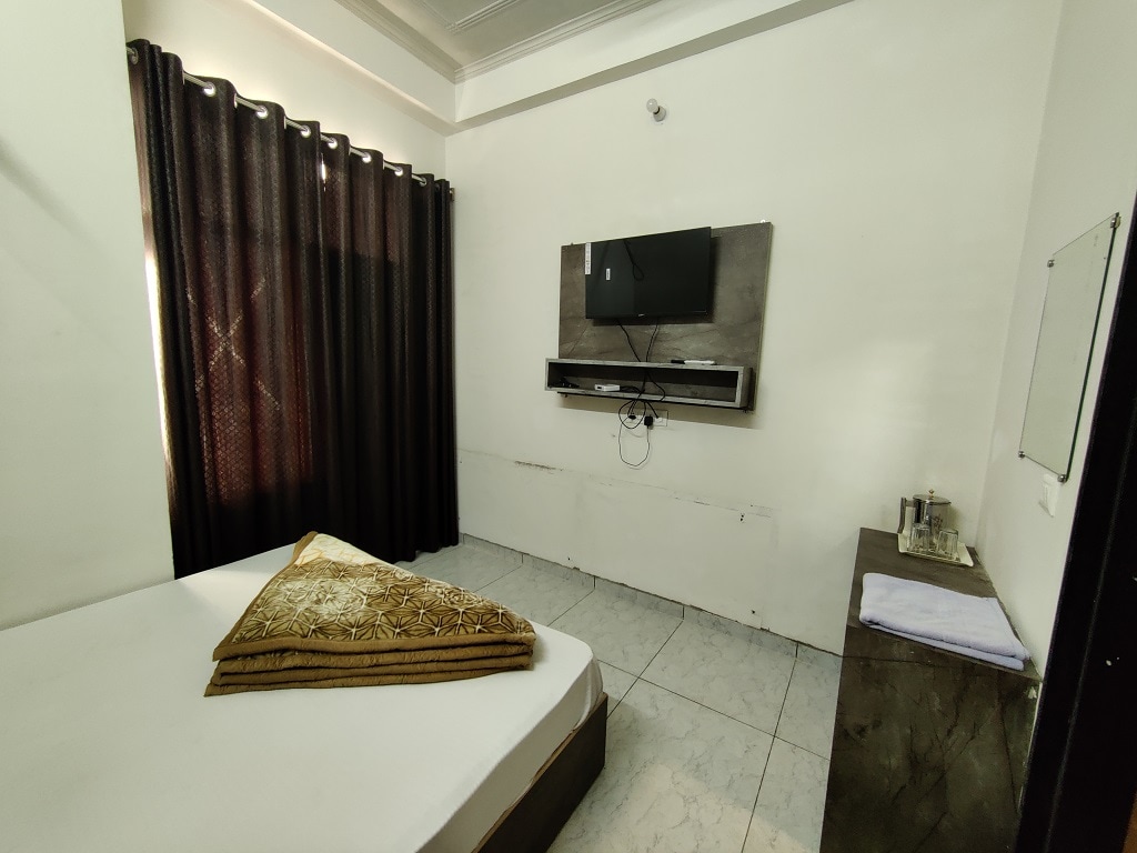 Hotel Raj Krishnam Khatushyam Ji - Tap to explore photos
