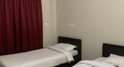 Zahir Residency Room Type - AC DELUXE ROOM WITH TWIN BED