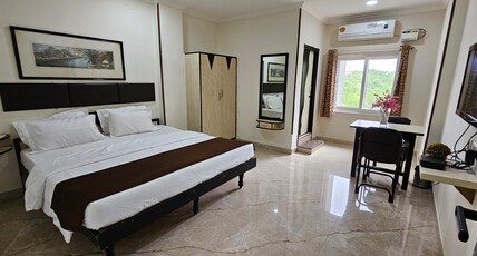 KODALI GUEST SUITES Room Type - Deluxe King Bed Room
