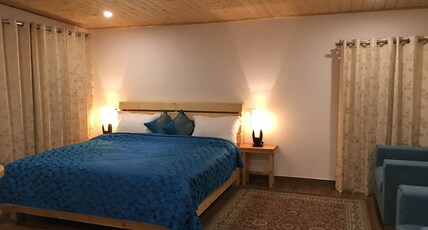 The Orange House | Valley-view Rooms Room Type - Blue Wooden-Room (Largest room without Balcony))