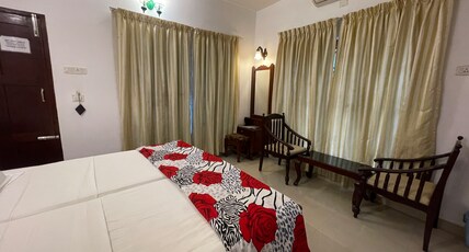 Chiramel Residency Room Type - Budget Double AC Room