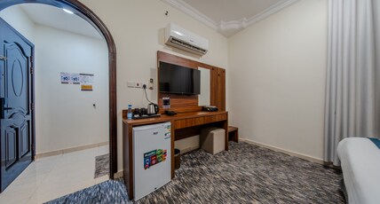 Alfakhamah Aldahabi Hotel Alshuhada Room Type - Double room Alfakhamah Aldahabi Hotel Alshuhada Room Type - Double room