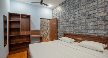 MUGUNDANS  SMART STAY Room Type - Standard Family Suite