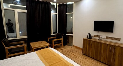 varlaxmi vatika Room Type - delux room 3