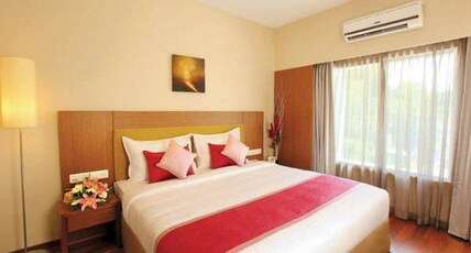 J K Residency Cheruvathur Room Type - Deluxe Room AC