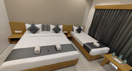Hotel Amrut Inn Hospitalities Room Type - Deluxe Triple Bed Hotel Amrut Inn Hospitalities Room Type - Deluxe Triple Bed