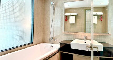 Ramada Graand Swiss Sukhumvit 11 Room Type - 1 King Bed, Executive Suite, Non-Smoking Ramada Graand Swiss Sukhumvit 11 Room Type - 1 King Bed, Executive Suite, Non-Smoking