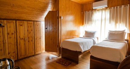 Grey Stone Hotel kalimpong Room Type - Delux Wooden Attic