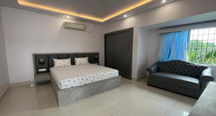 Gurukripa Room Type - Deluxe Room