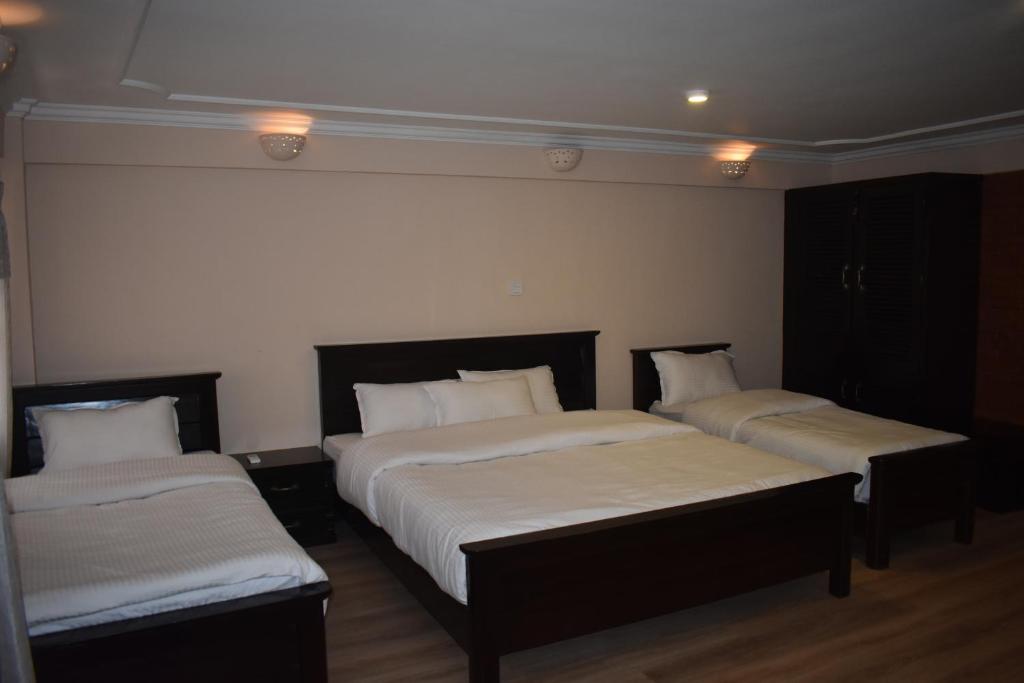 Hotel Heritage Malla - Tap to explore photos