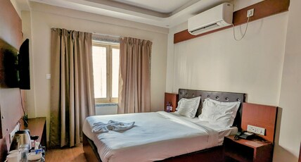 The Aster Enclave Room Type - Deluxe Room
