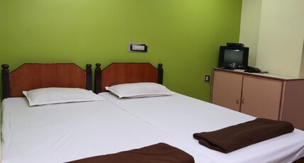 Hotel Vani Lodge Room Type - Deluxe Room (Non AC) Double Bedded