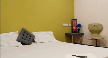 Hotel Sruti Room Type - Deluxe Room AC