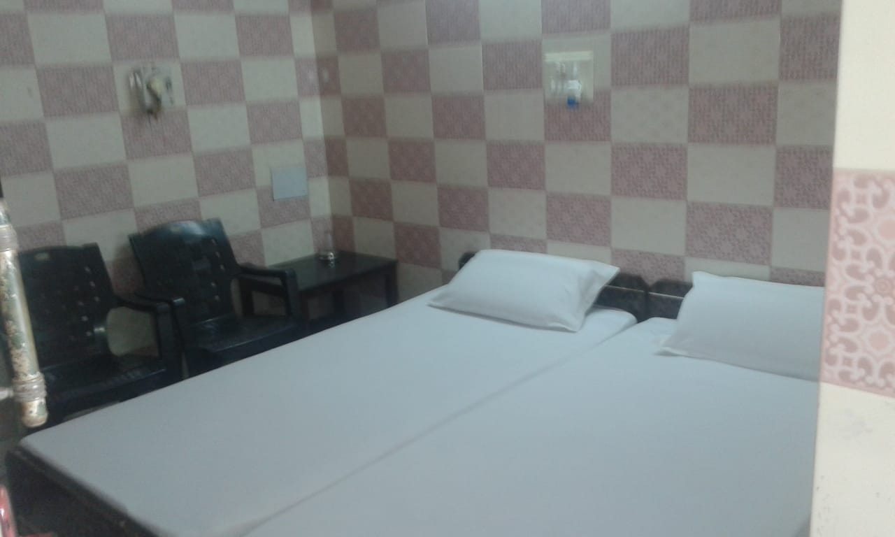 DWARAKALODGE - Tap to explore photos