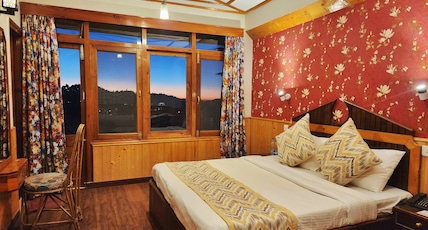 Pineview shimla near mall road Room Type - Premium Deluxe with balcony and and valley view Pineview shimla near mall road Room Type - Premium Deluxe with balcony and and valley view