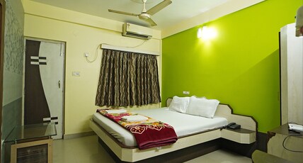HOTEL PRASANT Room Type - DELUXE CITY VIEW