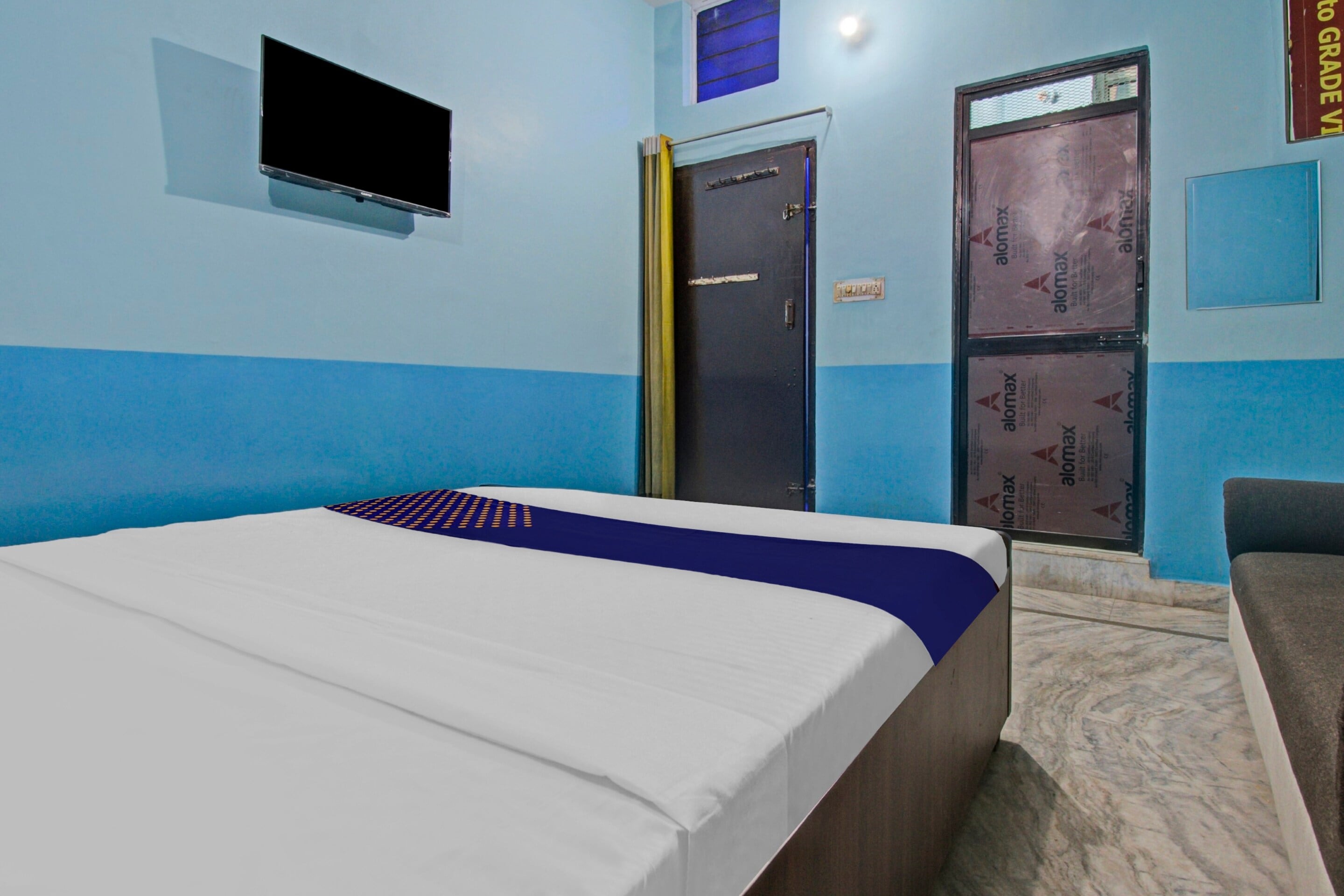 SPOT ON Hotel Rj14 - Tap to explore photos