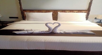 Midway treat Room Type - Deluxe Room