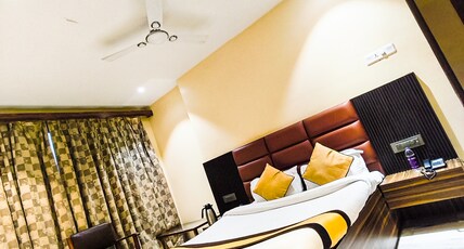AMBASSADOR HOTEL Room Type - DELUXE KING BED