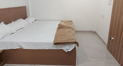 Aadishwar Room Type - Deluxe King Size Bedroom