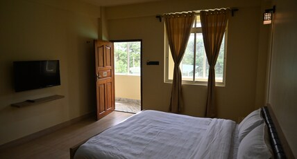 TreeTops Residency Room Type - Deluxe Double Room