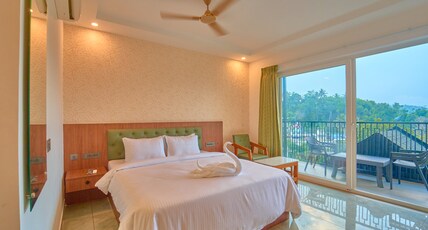 Nature Green Resort Munnar by VOYE HOMES Room Type - Premium AC Room with balcony