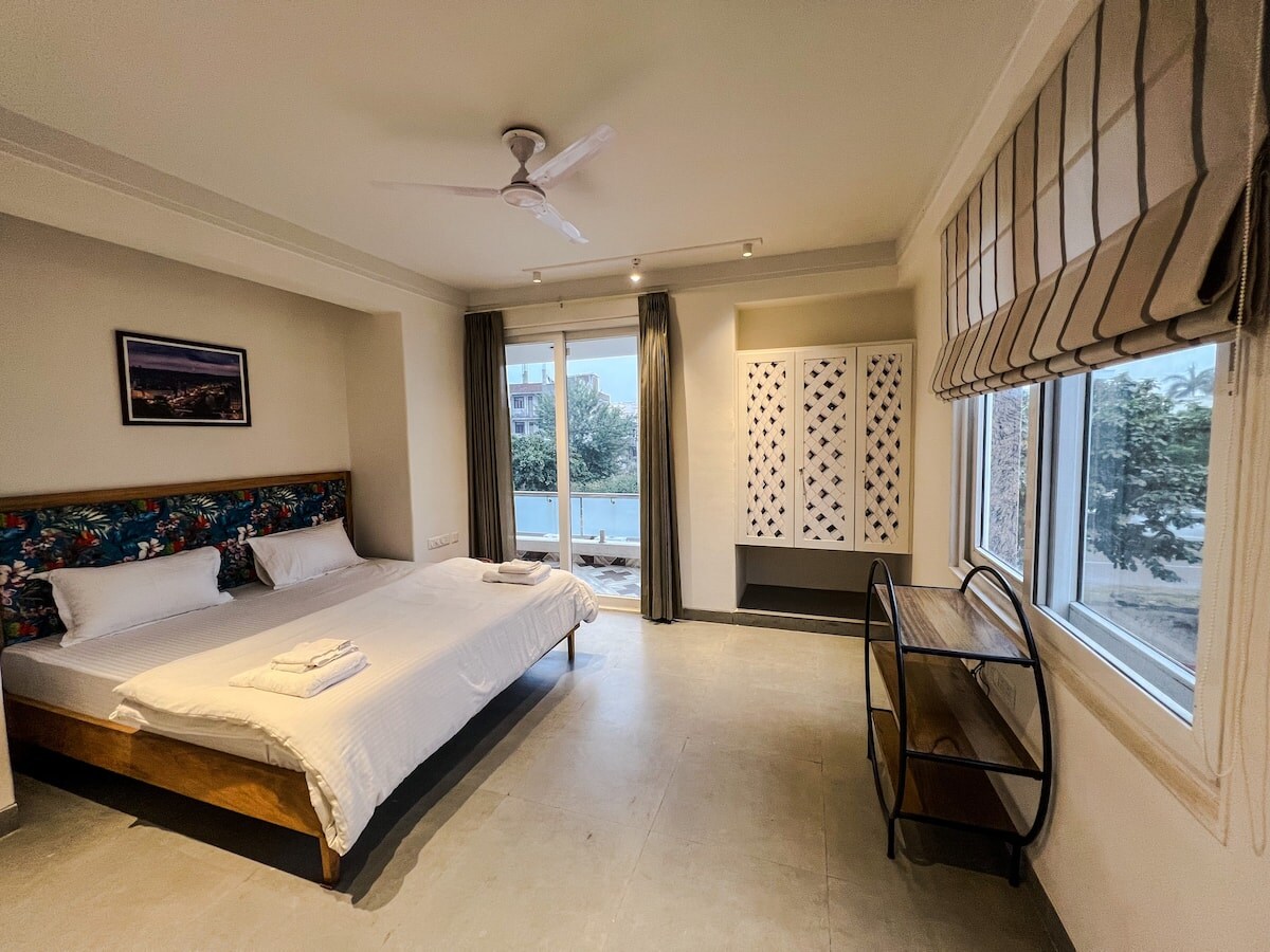 One Uptown 102 (modern 2BHK loft) - Tap to explore photos
