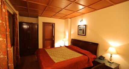 WelcomHeritage Windsor Lodge Room Type - Deluxe Room