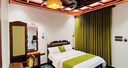 Orchid Beach Homes Cherai Room Type - Premium AC Room