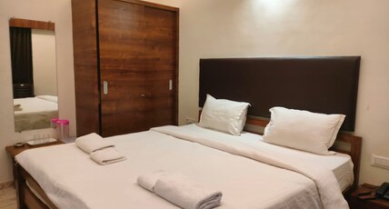 Arihant Plaza Room Type - Deluxe Room