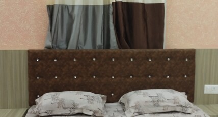 Shravan Hotel Room Type - Bedroom