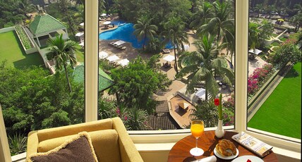 The Leela Mumbai Room Type - Premier Pool View Room with Bathtub
