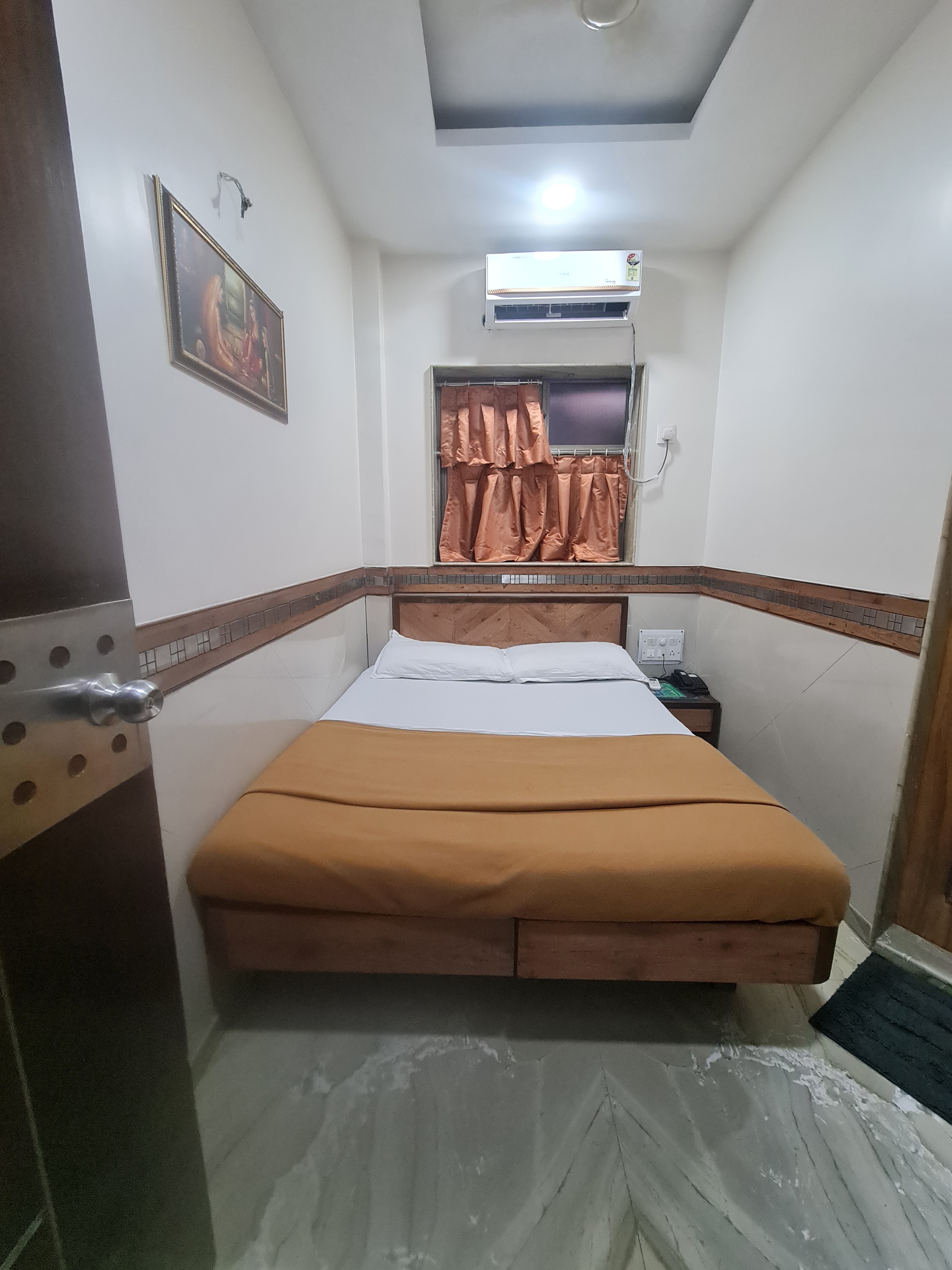 Hotel Sharda, Marine Lines - Tap to explore photos