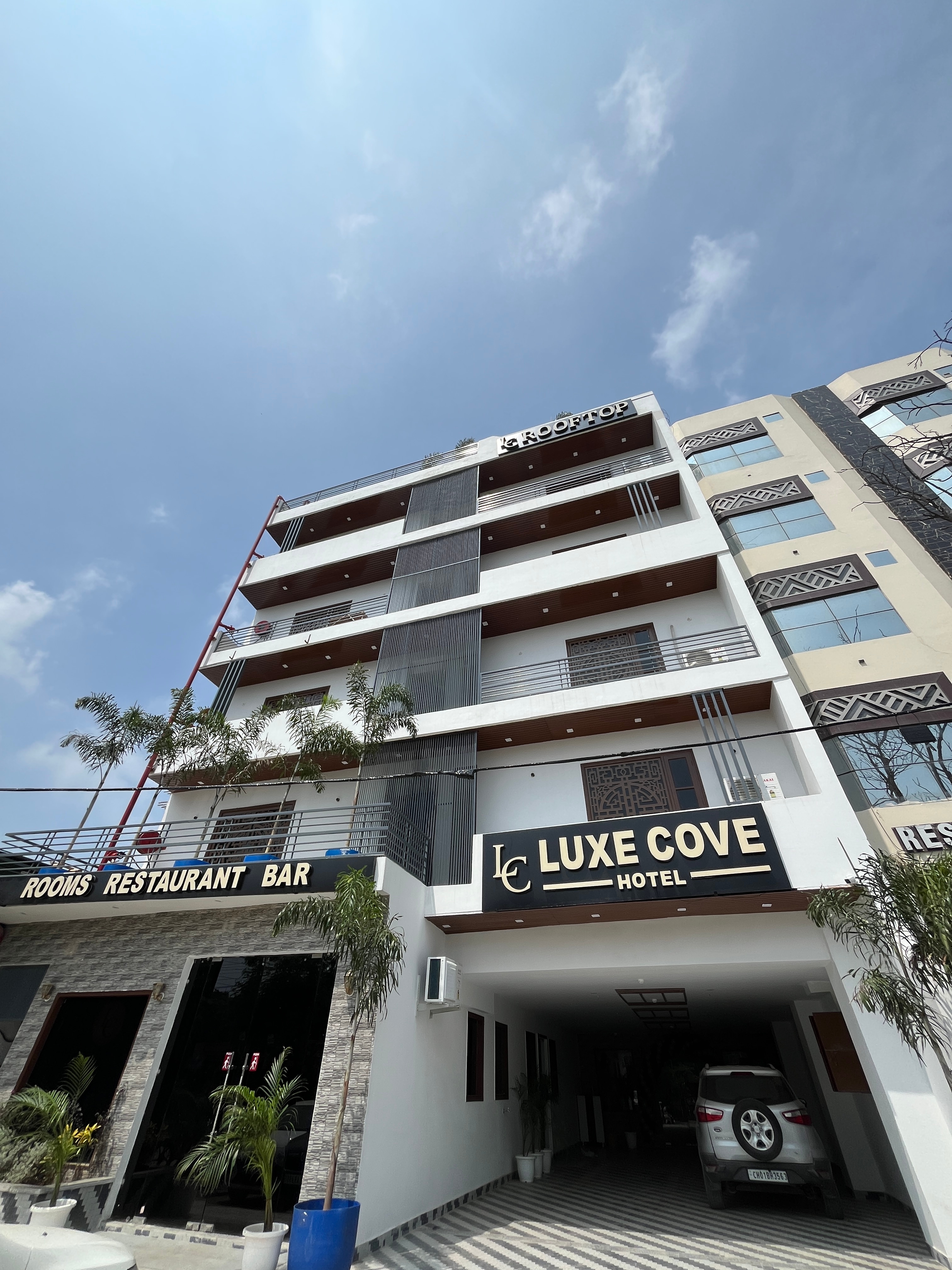 Luxe cove Hotel - Tap to explore photos