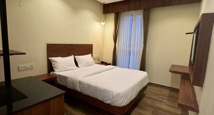 S K Legacy Room Type - Standard DELUXE QUEEN WITH FAN