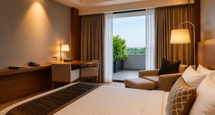 Kiranshree Grand Room Type - Club Room (work desk and 1 Way airport Transfer) Kiranshree Grand Room Type - Club Room (work desk and 1 Way airport Transfer)