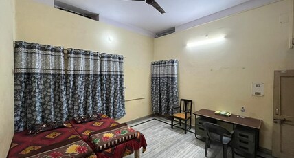 Vishwa Deva Home Stay Room Type - Standard Double Bed NON AC Room (Attached Washroom)