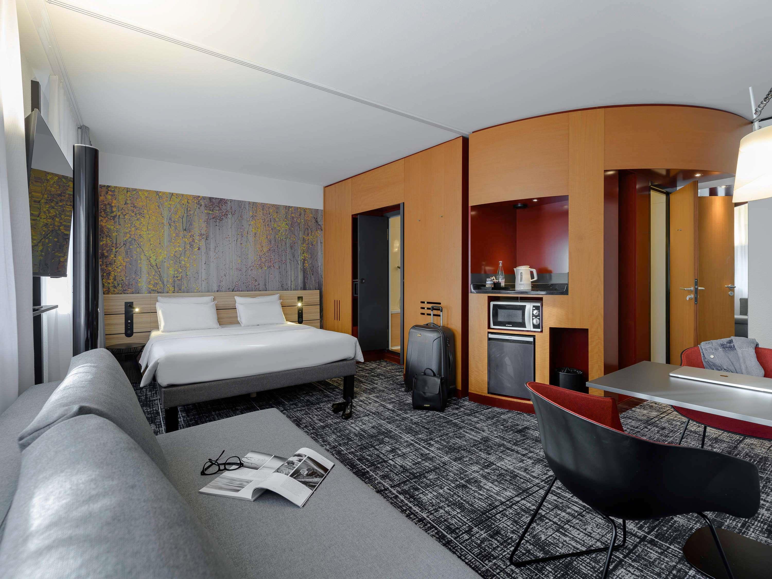 NOVOTEL SUITES MUC SCHWABING - Tap to explore photos
