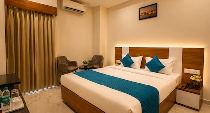 HOTEL PRIDE & RESTAURANT Room Type - Super Deluxe