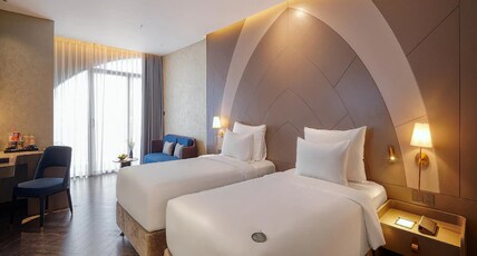 Champton Nha Trang Hotel Room Type - Champa Deluxe Twin with Partial Sea View Champton Nha Trang Hotel Room Type - Champa Deluxe Twin with Partial Sea View